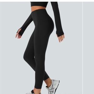 HALARA black fleece leggings with side pockets, size medium, 7/8 length